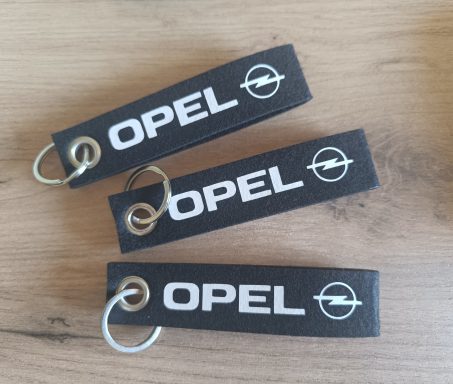 Schlüsselanhänger Opel schwarze Schlüsselanhänger aus Filz mit Opel Schriftzug